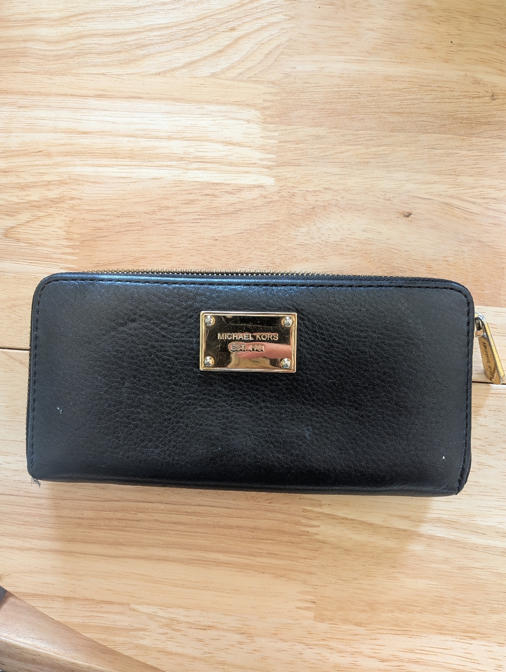 Michael Kors Black Leather Zip Around Wallet with Gold Plaque